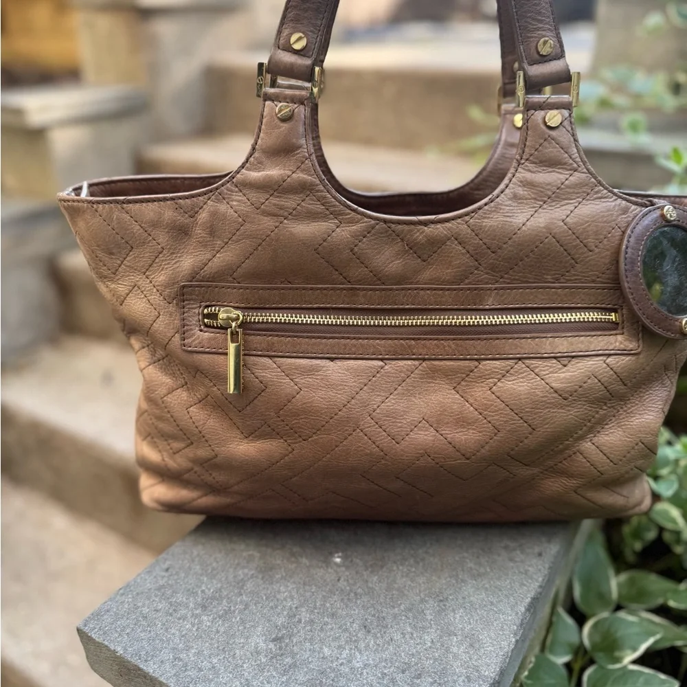 Gorgeous leather Tory Burch zip top Elegant Tan Tote with T stitching